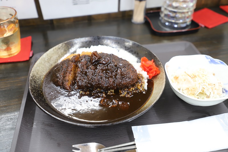 かつ